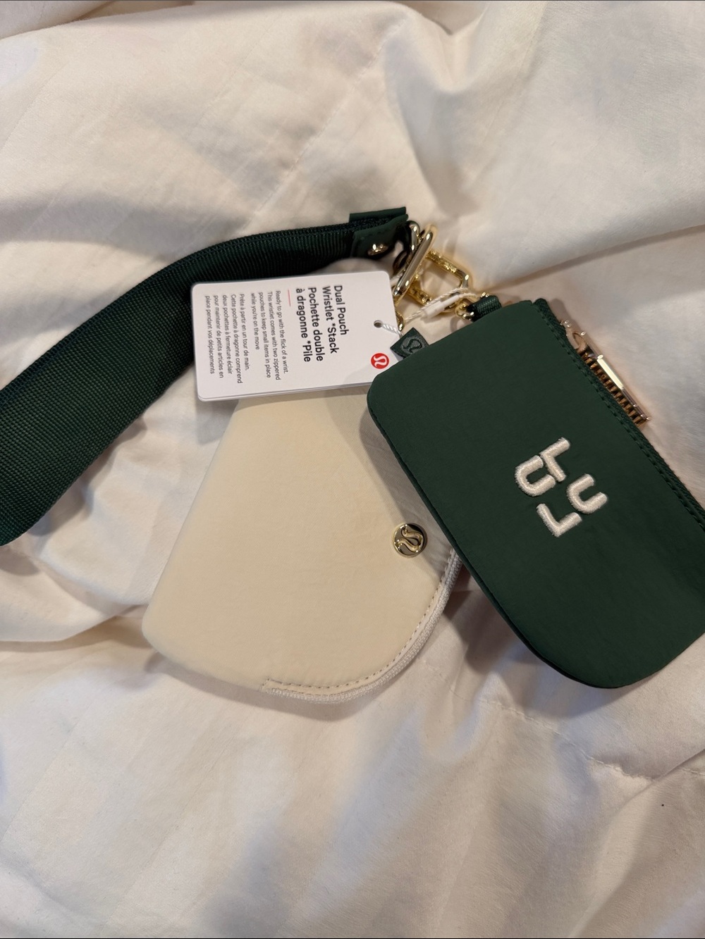 lululemon green zip pouch with cream card case